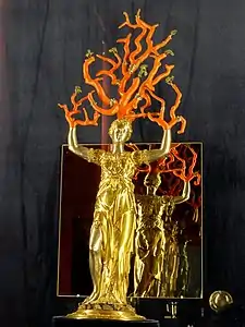 Statuette of Daphné by Wenzel Jamnitzer (1569-76).  Gilded silver and coral.