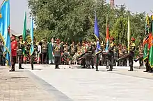 Image 16President Hamid Karzai observing the honor guard of the Afghan armed forces during the 2011 Afghan Independence Day. (from Culture of Afghanistan)