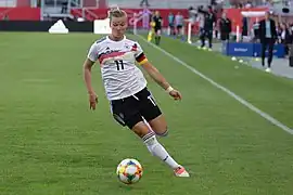 Popp during an international friendly against Chile, 2019