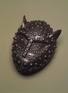 Box in the form of a leopard's head; 19th century; 17.1 x 14&nbsp;cm (63⁄4 x 51⁄2 in.); Brooklyn Museum (New York City). This box was used to hold kola nuts presented to visitors in the royal court of Benin. Leopards are one of the most commonly portrayed animals in African art. Intelligent and courageous, they often serve as metaphors for powerful individuals or associations