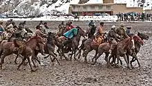 Image 19Players in a game of buzkashi, the national sport (from Culture of Afghanistan)