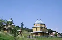 Church of St. of Archangel Michael (wooden, 1860) and bell tower