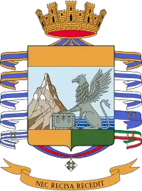 Coat of arms of the Guardia di Finanza, depicting the Cimon della Pala