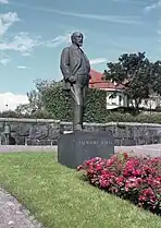 Statue of Aho by Aimo Tukiainen at Engelinaukio Square in Helsinki