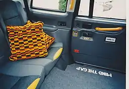 Home (cushions) by Rachel Beckett and Mind The Gap (mat) by Peter Liversidge