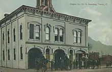 Exterior of Engine Company Number Five building with firefighters, horses, and engines arrayed in front of building, 601 Broadway Street, Toledo, Ohio. In use between 1873 and 1968.