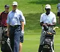 Ernie Els and Club Caddie Trevor Spencer during the 2006 Buick Classic