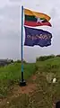 The flag of Myanmar flown alongside the flag of Tanintharyi Region on 1199 Mountain Peak in Kawthaung.