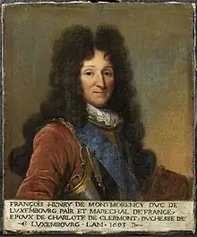 Half-length portrait of a clean-shaven man wearing a high wig and armour.