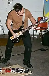 Gabriel Saloman playing electric guitar