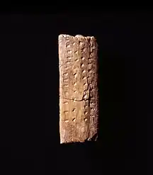 The Adorant of Geissenklösterle, reverse side with notches