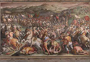 Giorgio Vasari (1511–1574) used earth colors, including ochre and sienna, in his frescos such this in the Hall of the Five Hundred at the Palazzo Vecchio in Florence. In his writings Vasari referred to sienna as terra rossa.