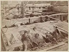 Workmen filling in tile vault domed ceilings