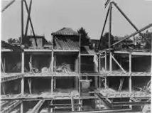Black and white photograph of the interior of the Car Barn during re-construction