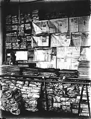 Interior of Ferry Museum showing shelves with papers and newspapers, Tacoma, Washington, ca 1911