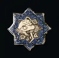 Star with wrestling motif