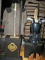 An old Japanese wood club with iron spikes (a kanabō or tetsubō), 4′ 9″ long and 4&nbsp;lb (1.8&nbsp;kg) in weight.