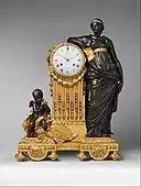 Neoclassical mantel clock ("Pendule Uranie"); 1764–1770; case: patinated bronze and ormolu, Dial: white enamel, movement: brass and steel; 71.1 × 52.1 × 26.7&nbsp;cm; Metropolitan Museum of Art