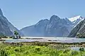 View from head of Milford Sound of some of the Darrant Mountains on the north side of sound being The Lion and beyond it Rover Peak 1,524&nbsp;m (5,000&nbsp;ft) and snow covered Mount Pembroke 2,015&nbsp;m (6,611&nbsp;ft).