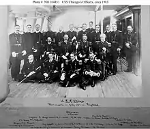 Wood as a lieutenant, seated on the deck in the front row on the right in this photograph of the officers of the protected cruiser USS&nbsp;Chicago, ca. 1903.
