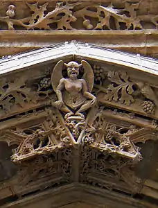The mythical figure at the top of the west portal (19th c.)