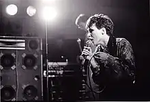 Murray performing live with the Invisible Girls at the Paard van Troje in The Hague, Netherlands, in 1981