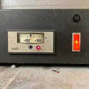 12. Meanwhile, the oven is preheated (in this case to 825&nbsp;°C).