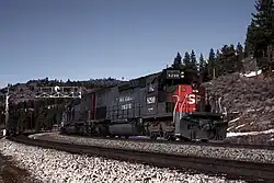 A Southern Pacific freight train passes through Hirschdale in 1988, photograph by Drew Jacksich