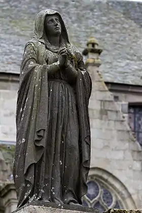 The Virgin Mary looks up towards Jesus on the cross- The Larhantec calvary at Saint-Thégonnec