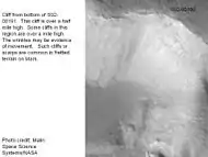 Enlargement of the photo on the left showing cliff.  Photo taken with high-resolution camera of Mars Global Surveyor (MGS), under the MOC Public Targeting Program.