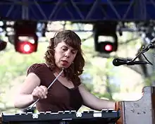 Conlee performing with The Decemberists (2009)