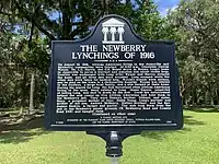 A color photograph of the front of the plaque at Pleasant Plain United Methodist Church in Jonesville, Florida
