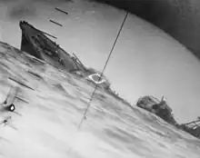 Torpedoed Japanese destroyer Yamakaze photographed through periscope of USS&nbsp;Nautilus, 25 June 1942.