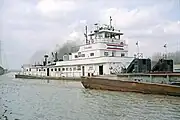 Towboat R. W. Naye upbound in Portland Canal on Ohio River (1 of 2), Louisville, Kentucky, USA, 1999