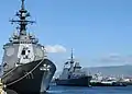RSS Supreme passes by JS Atago in Pearl Harbor during RIMPAC 2010.